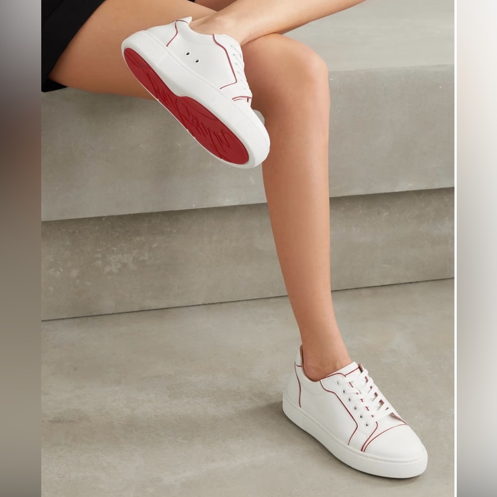 Christian Louboutin's 'Vieirissima' sneakers with contrasting red edges & soles